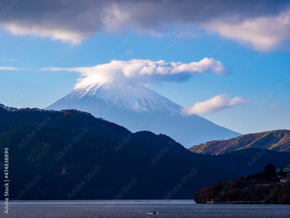 Snowy Mount Fuji behind caldera lake (view from Lake Ashinoko, Hakone, Kanagawa, Japan)
