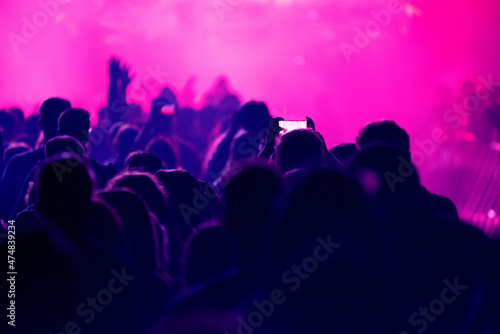 Crowd of people celebrating the New Year's Eve at a party