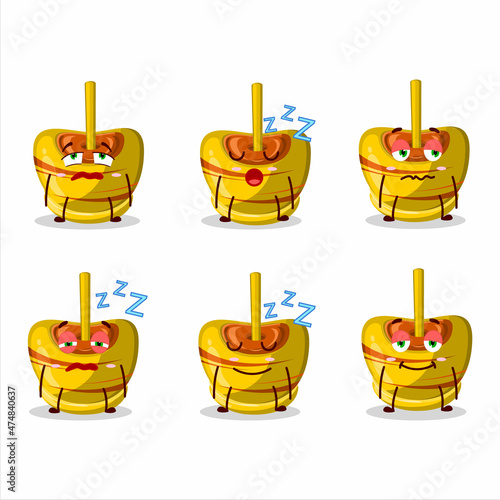 Cartoon character of yellow sugar candy with sleepy expression