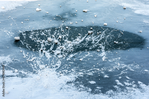 Wallpaper Mural A large block of snow fell on the icy surface of the frozen river. Winter background and ice texture. Torontodigital.ca