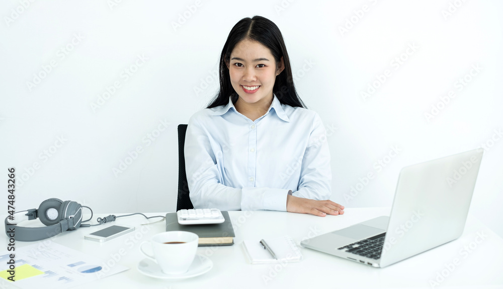Asian woman Successful smiling businesswoman sitting working at the office Asian woman Successful smiling businesswoman sitting working at the office