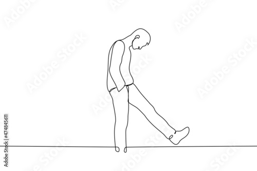 young man with bowed head and shoulders dangles his leg back and forth - one line drawing vector. concept of laziness, procrastination, anxious expectation