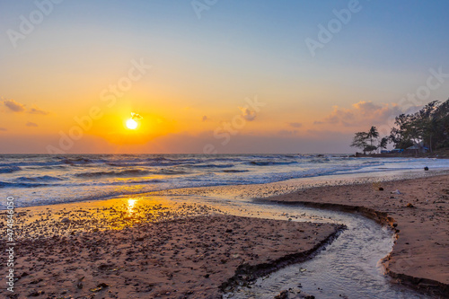 Beautiful sea waves in the morning sunrise. photo