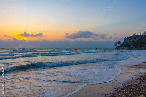 Beautiful sea waves in the morning sunrise.