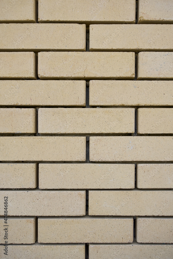 brick wall close up. wall of light bricks. photo can be used as photo background brick wall close up. wall of light bricks. photo can be used as photo background