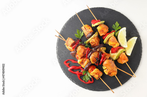 Photos Concept of tasty food with chicken shashlik on white background
