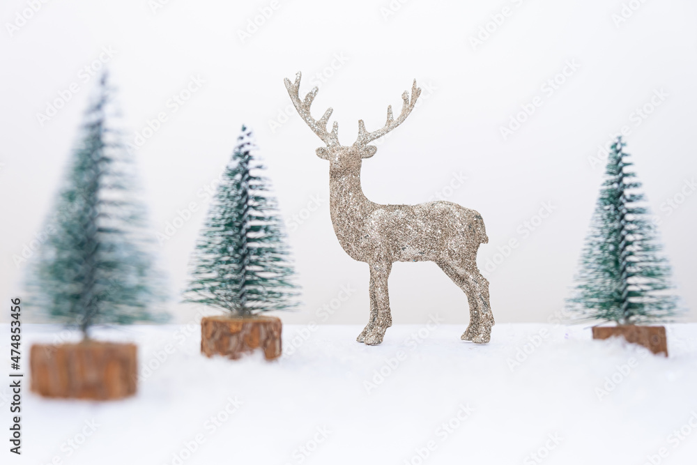Naklejka premium Decoration christmas tree new year background with snowflakes and deer white background copy space