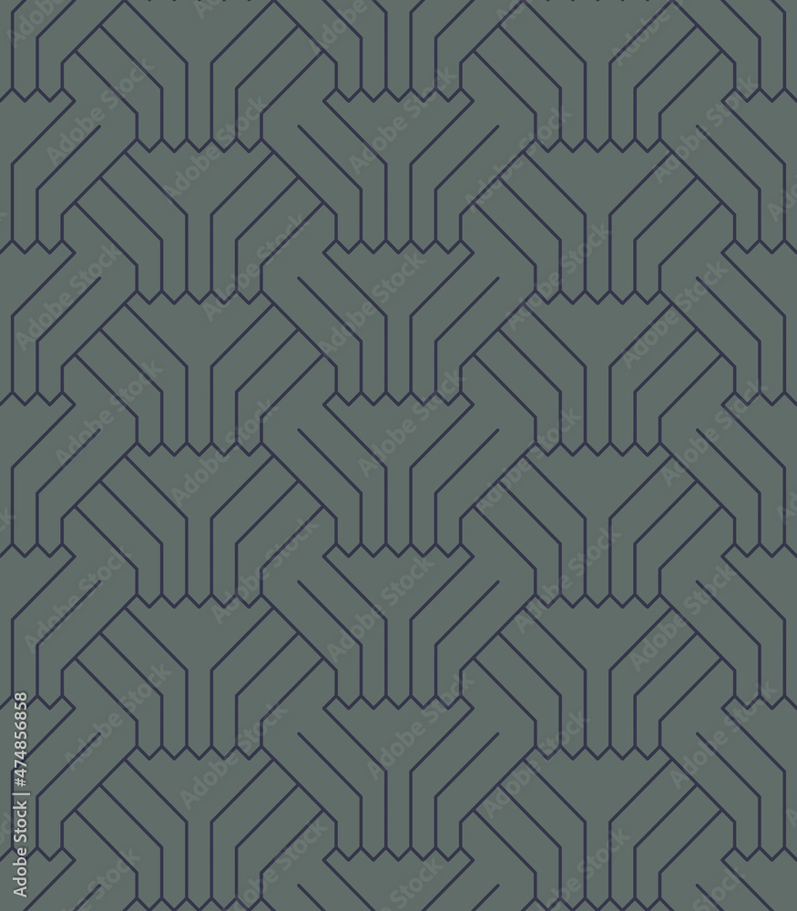 Dark blue ornament on a dark green background Dark blue ornament on a dark green background