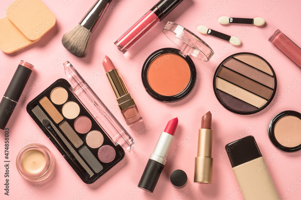 Beauty products. Make up products at pink background. Eye shadow, powder, lipstick for professional make up. Beauty products. Make up products at pink background. Eye shadow, powder, lipstick for professional make up.