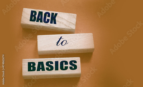 Fotografie Back to basics text on wooden cubes