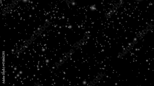 snow fog on a black background. abstract Flying dust particles on a black background. Vast snow isolated on black background.