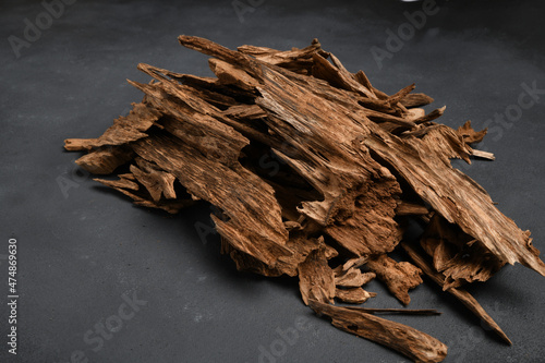 Close UpShot Of Sticks Of Oudh On Black Background 