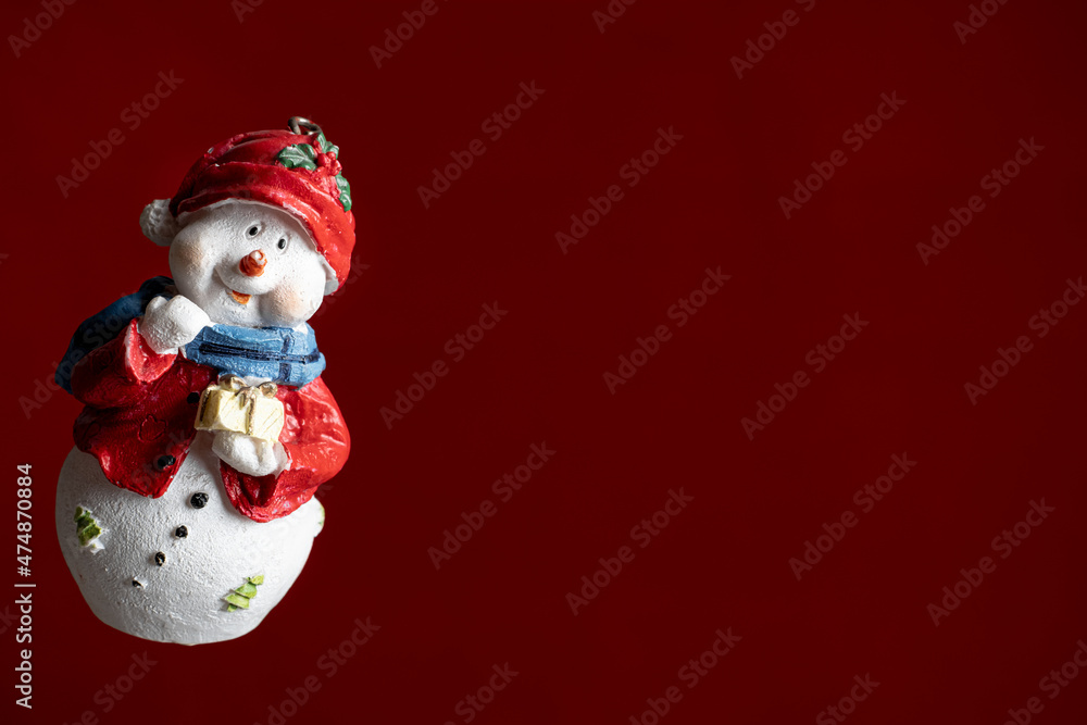 Happy snowman looking out the corner. Blank banner. Christmas greeting card, festive poster, invitation template Happy snowman looking out the corner. Blank banner. Christmas greeting card, festive poster, invitation template