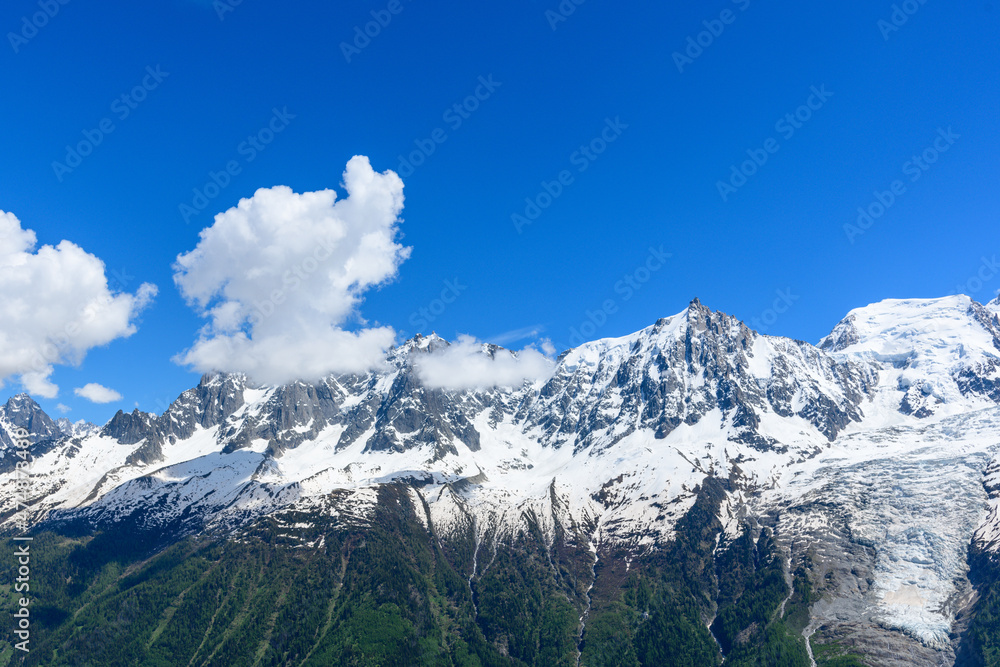 The Mont Blanc Massif in the Mont Blanc Massif in Europe, France, the Alps, towards Chamonix, in summer on a sunny day.