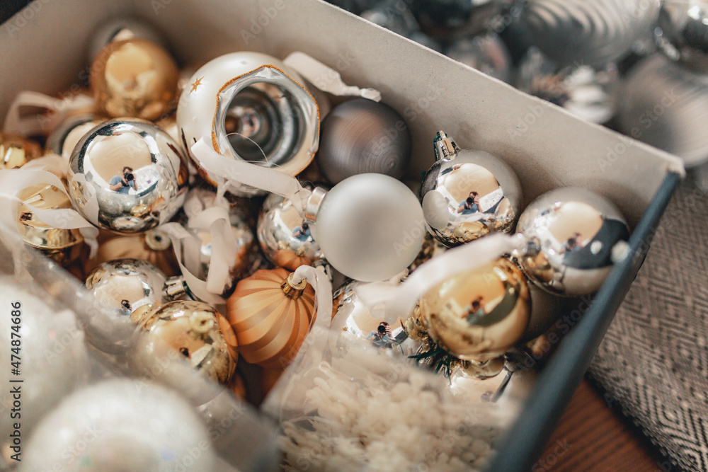 Obraz premium Box with bright glass Christmas balls close-up.
