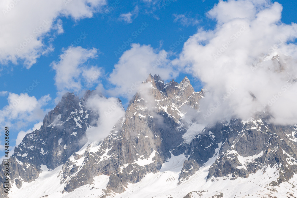 The Aiguille de Blaitiere and the Aiguille du Plan in the Mont Blanc massif in Europe, France, the Alps, towards Chamonix, in summer, on a sunny day.