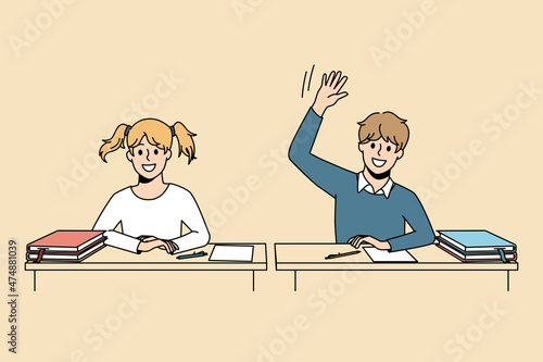 Educational process and learning concept. Smiling pupils boy and girl sitting at lesson and raising hand ready to answer having knowledge vector illustration 