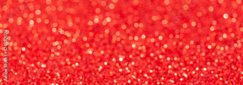 sparkles of Red glitter abstract background. Copy space