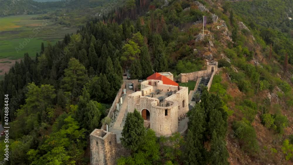 Besac fortress in mountains above Virpazar, Montenegro. Aerial view. Besac fortress in mountains above Virpazar, Montenegro. Aerial view.