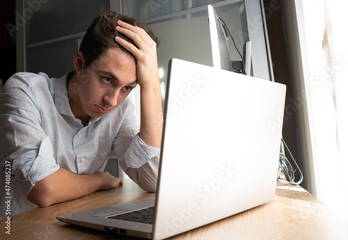 Stressed student with problem. Difficult exam, trouble, difficult connection, crash, remote lessons.