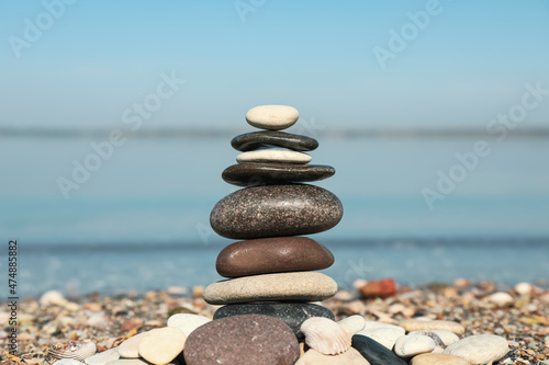 Stack of stones on beach  closeup. Harmony and balance concept