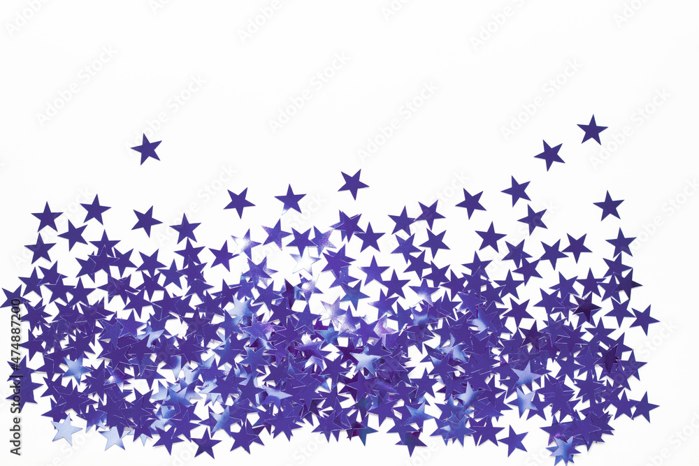 Christmas border with star confetti. Holiday background for New Year in very peri trendy color of the year 2022. Christmas border with star confetti. Holiday background for New Year in very peri trendy color of the year 2022.