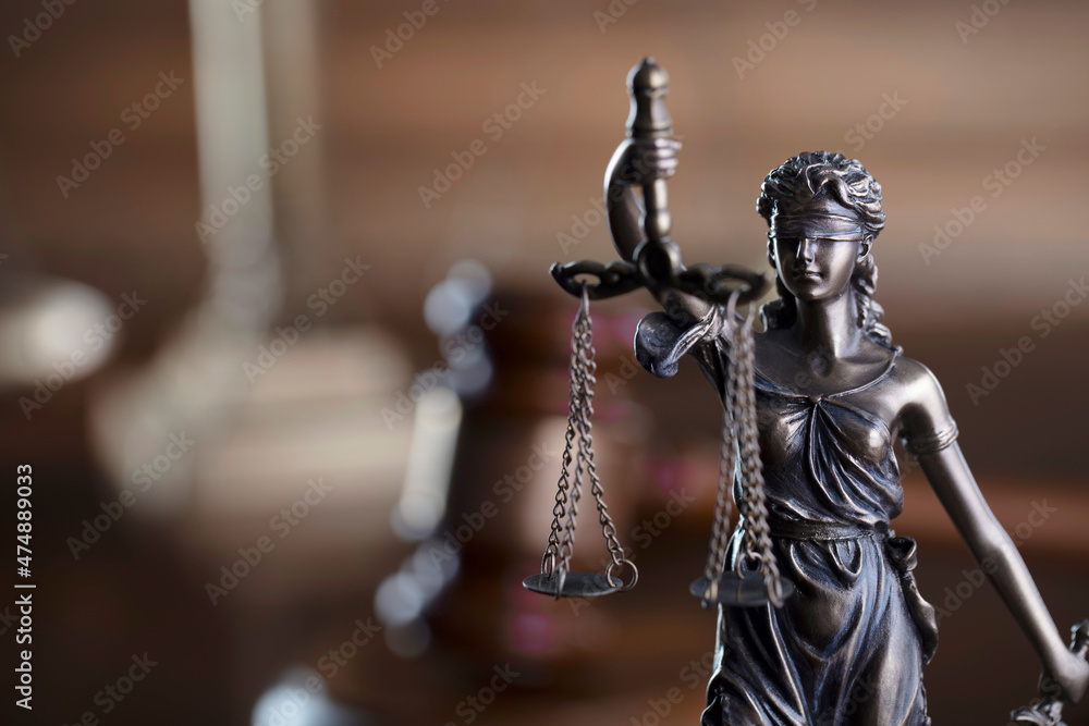 Judge office. Law and justice symbols composition: judge’s gavel, scale and Themis sculpture. Judge office. Law and justice symbols composition: judge’s gavel, scale and Themis sculpture.