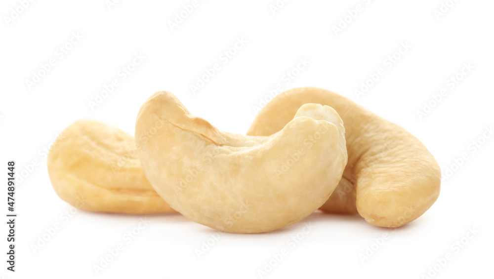 Pile of tasty organic cashew nuts isolated on white Pile of tasty organic cashew nuts isolated on white
