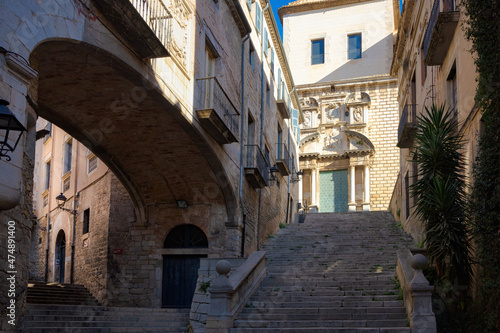 View of the streets of the historic center of Girona that go up to the church of San Marti  Catalonia  Spain