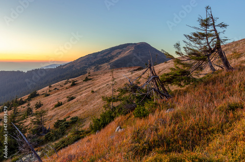 Magical sunset in the Carpathians overlooking Strimba peak, Gorgany region, Ukraine. Tourism and mountains concept. photo