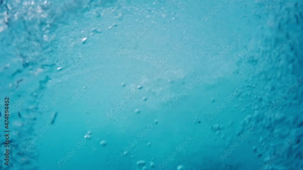 Ocean wave. Crystal clear ocean wave rolls and breaks. Indian Ocean's wave breaking on the Maldivian shore Ocean wave. Crystal clear ocean wave rolls and breaks. Indian Ocean's wave breaking on the Maldivian shore