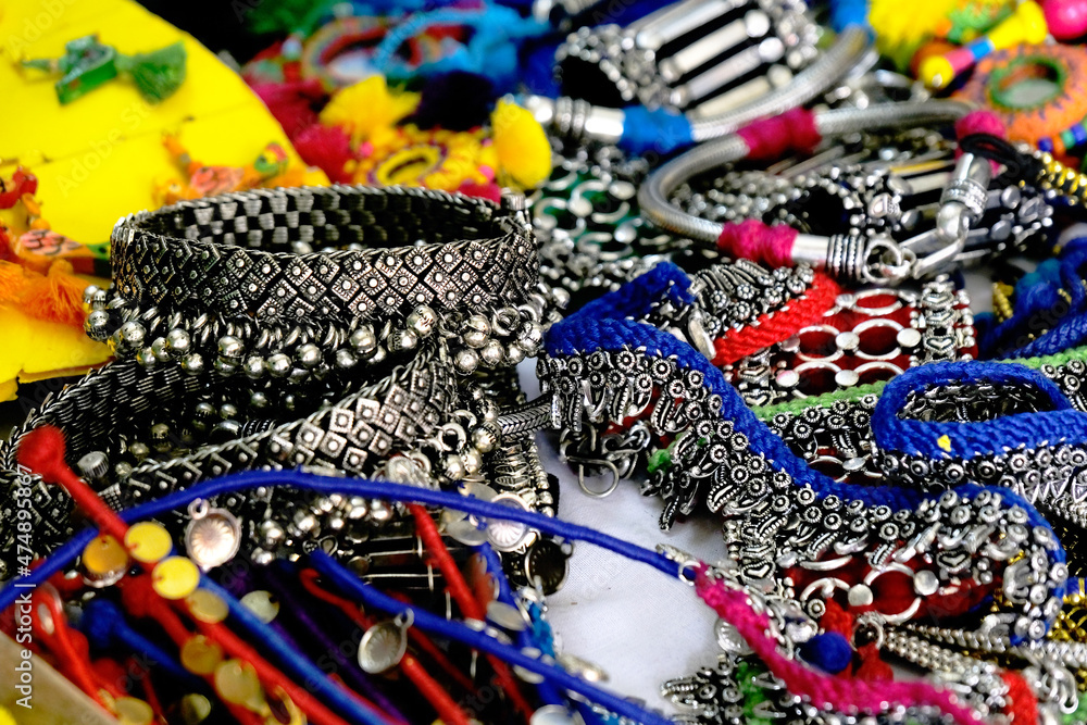 Fototapeta premium Indian Traditional jewellery displayed in a street shop for sale in Pune, Maharashtra. Indian art, Indian Traditional jewelry.
