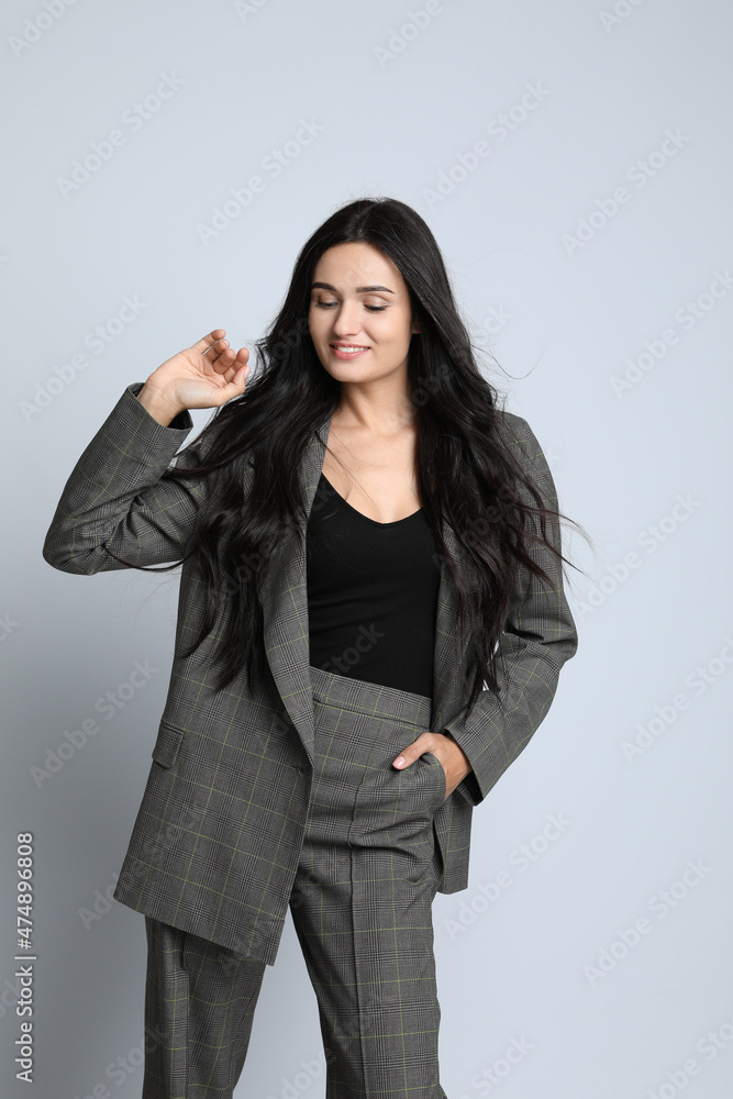 Beautiful woman in formal suit on white background. Business attire Beautiful woman in formal suit on white background. Business attire
