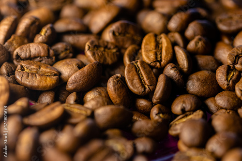 Many roasted coffee beans close up