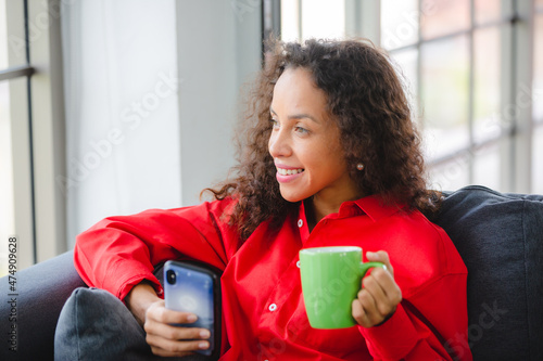 African American woman drin...