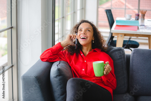 African American woman drin...