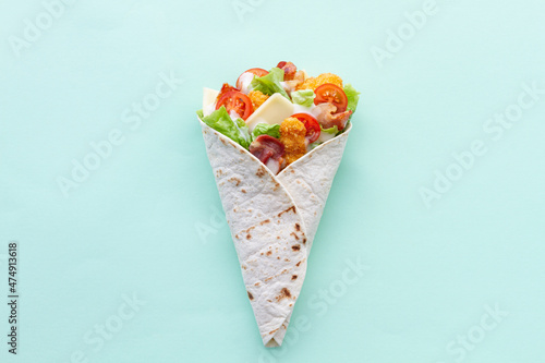 Chicken wrap with tomatoes and cheese