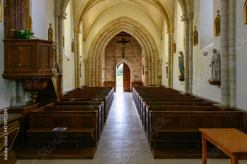 The aisle of the church in the traditional French village of Saint Sylvain in Europe, France, Normandy, towards Veules les Roses, in summer on a sunny day.