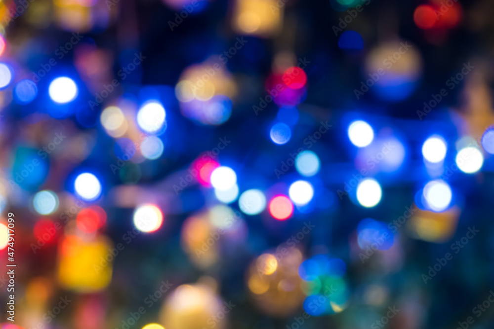 Colorful defocused bokeh lights in blur night background. Abstract circular bokeh background of Christmaslight Colorful defocused bokeh lights in blur night background. Abstract circular bokeh background of Christmaslight