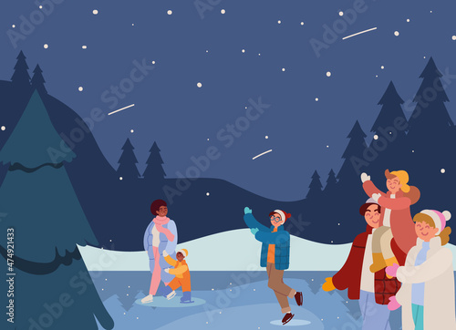 family playing in snow