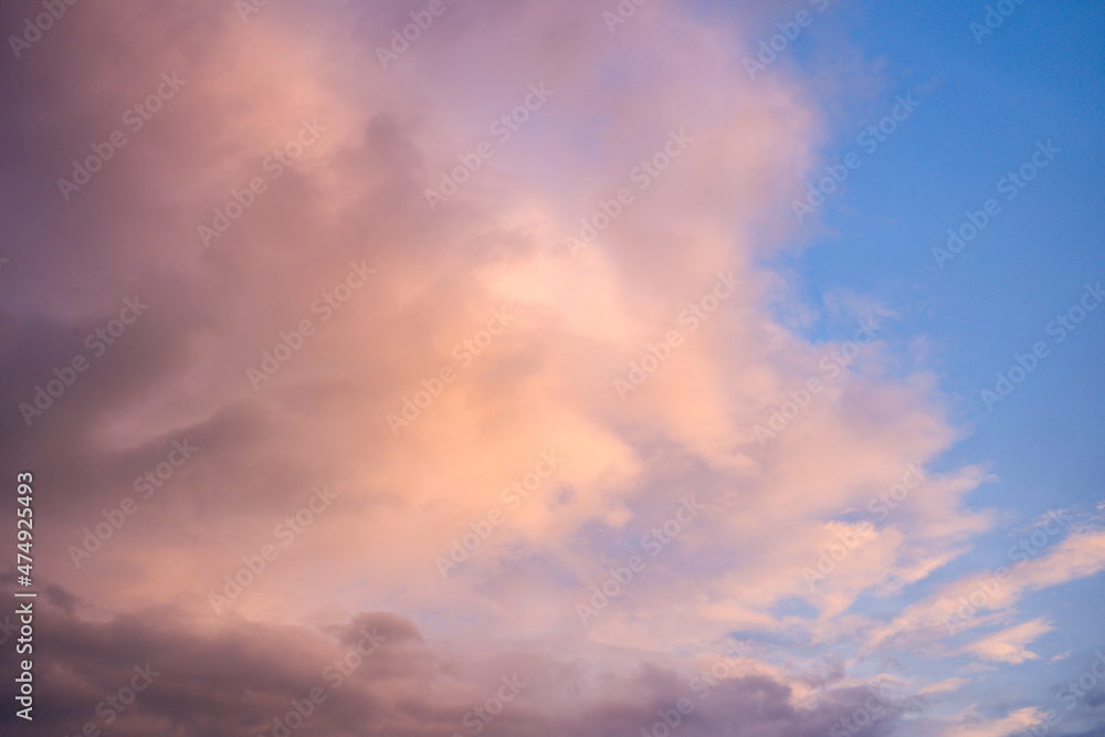 Pinkish clouds in Europe, France, Occitanie, Herault, in summer, on a sunny day.
