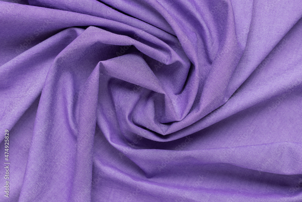 Trendy Color of the year 2022. Very Peri. violet crumpled fabric background Trendy Color of the year 2022. Very Peri. violet crumpled fabric background