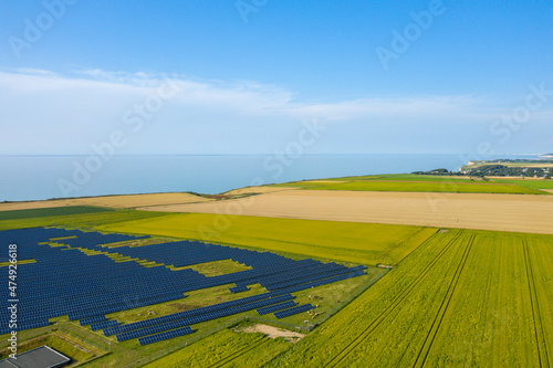 Norman Solar Panels in the beautiful countryside in Europe, France, Normandy, in summer on a sunny day.