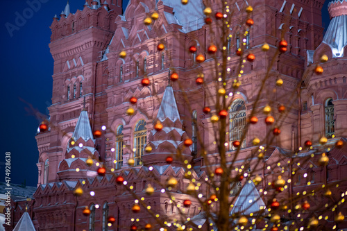 Tree painted with christmas lights. Moscow.