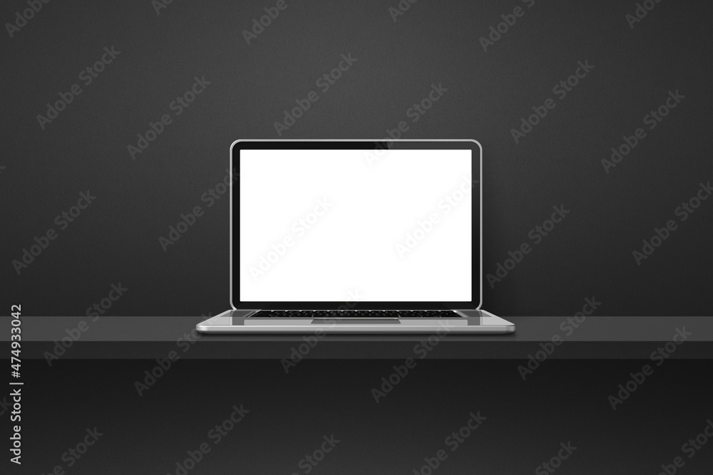 Laptop computer on black shelf background Laptop computer on black shelf background