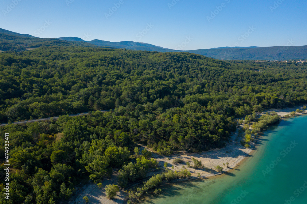 Forests at the edge of Lake Sainte-Croix in Europe, France, Provence Alpes Cote dAzur, Var, in summer, on a sunny day.