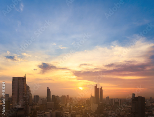 Cityscape of modern buildings and urban architecture. Aerial view of Bangkok city at twilight sunset in Thailand. © bigy9950