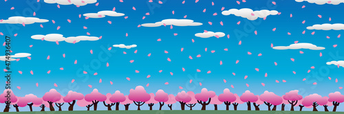 桜舞う春の青空と雲