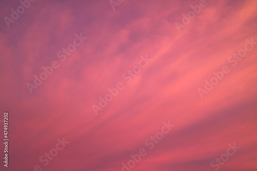Fototapeta Naklejka Na Ścianę i Meble -  Stunning Gradient Purple and Pink Cloudy Sky with Sunset Afterglow