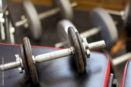 Close-up shot of some dumbbells' in a gym. 